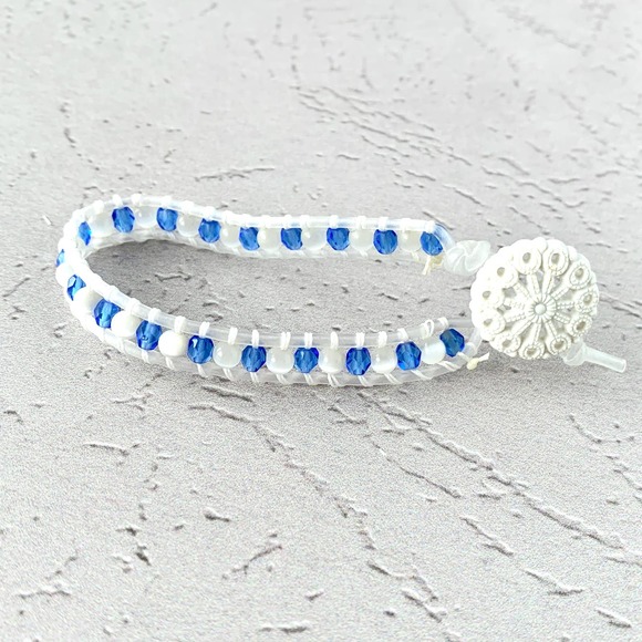 Sapphire Faceted Glass Single Wrap Clear Cord Bracelet - Picture 3 of 3
